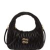 18464339_39601277_1000.jpg Miu Miu mini Wander matelassé shoulder bag