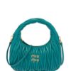 18464341_39600106_1000.jpg Miu Miu mini Wander matelassé shoulder bag