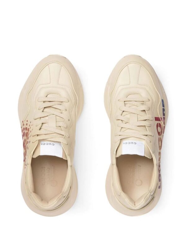 18631290_40412010_1000.jpg Gucci Rhyton glitter-logo chunky trainers