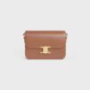 187363BF4-18BU_1_SPR23.jpg CELINE CLASSIQUE TRIOMPHE BAG IN shiny calfskin