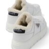 Prada triangle-plaque low-top sneakers