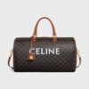 191482CYX-04LU_1_SUM23.jpg CELINE Medium Travel Bag IN Triomphe Canvas with Celine Print