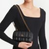 19447912_43787118_1000.jpg Tory Burch Kira quilted leather crossbody bag