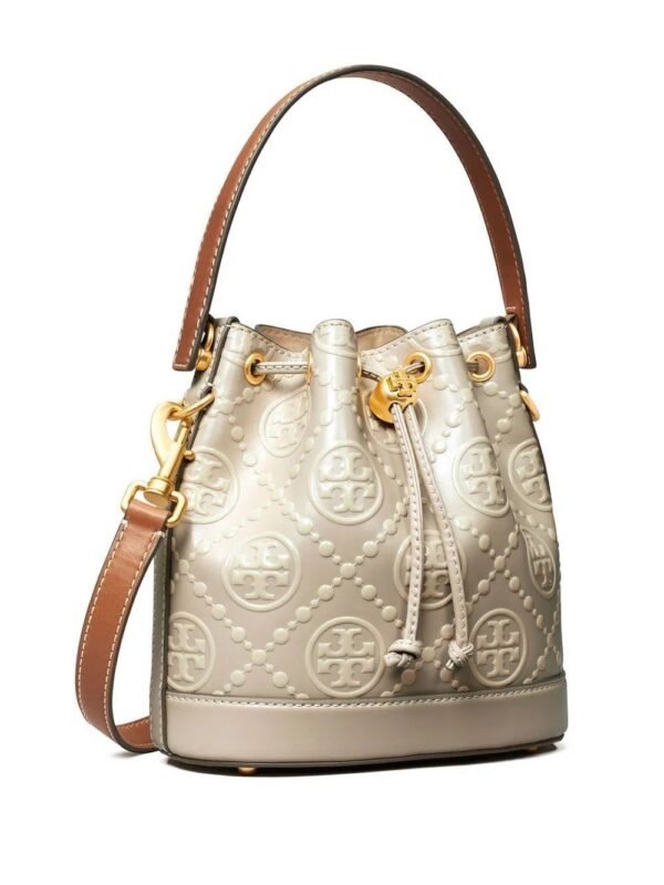 19447949_43785151_1000.jpg Tory Burch monogram-embossed bucket bag