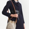 19447949_43785162_1000.jpg Tory Burch monogram-embossed bucket bag