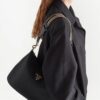 19566188_43662445_1000.jpg Prada triangle-logo shoulder bag