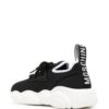 19850517_44621686_1000_d39f8137-8478-4afc-aacd-3c40e4bd9052.jpg Moschino logo-patch low-top sneakers