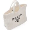 20097015_45228541_1000.jpg Prada logo-embroidered raffia tote bag