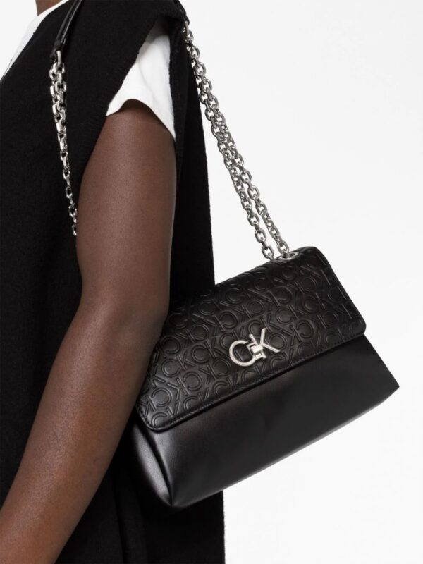 20259770_50467677_1000.jpg Calvin Klein Re-Lock embossed crossbody bag