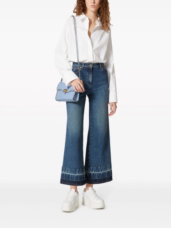 21676743_51928149_1000.jpg Valentino Garavani small Rockstud leather crossbody bag