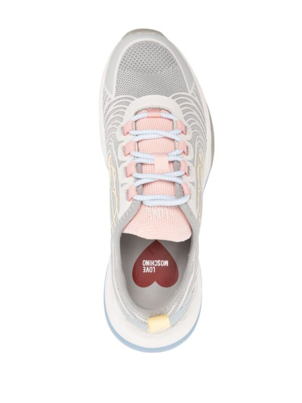 22025650_51806175_1000_f493697e-c9f1-4156-86e0-4a4c3c44c879.jpg Love Moschino logo-patch panelled sneakers