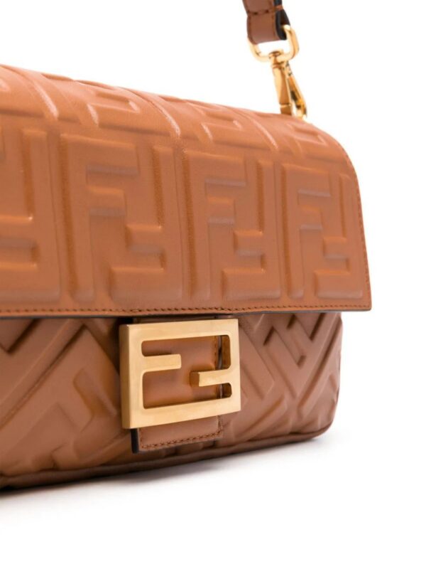 22363216_52296999_1000.jpg FENDI Baguette FF-embossed shoulder bag
