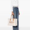 22695722_53366559_1000.jpg Gucci logo-print canvas tote bag