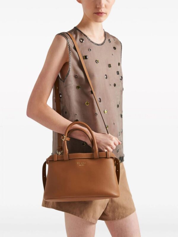 22729049_52715467_1000.jpg Prada small belted leather two-way bag
