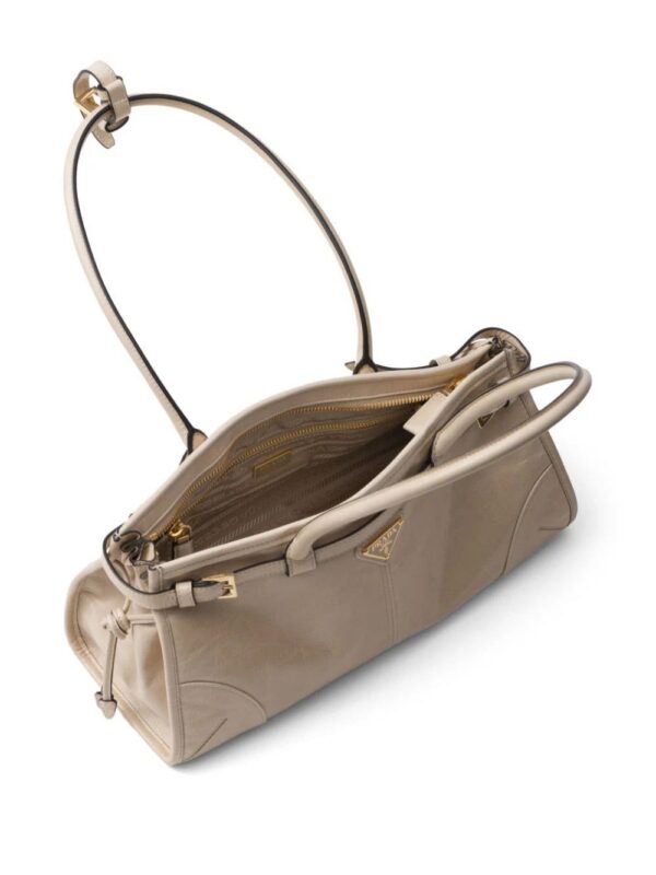 22915184_52981103_1000.jpg Prada medium triangle-logo belted handbag