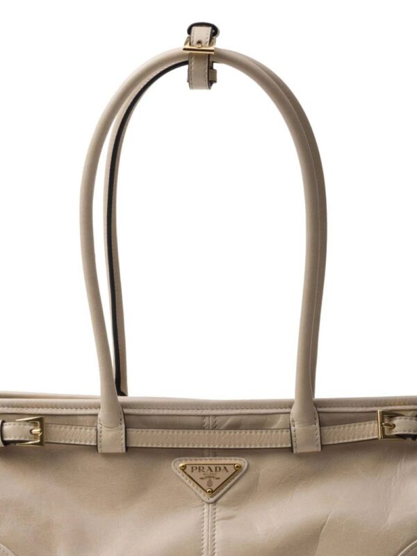 22915184_52981104_1000.jpg Prada medium triangle-logo belted handbag