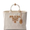 23048904_53161933_1000.jpg Prada large logo-appliqué tote bag