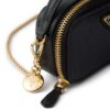 23048911_53161915_1000.jpg Prada Saffiano-leather triangle-logo mini bag