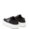 23558432_53524453_1000_4e023b49-50fb-4499-a584-18f2ac4373f3.jpg Prada Double Wheel low-top sneakers