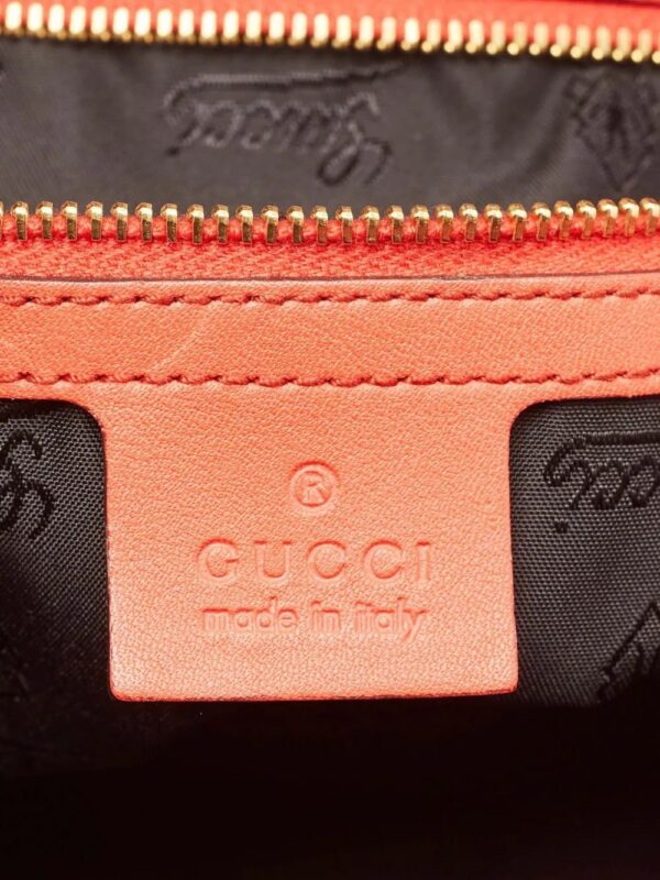 31330440_60932881_1000.jpg Gucci leather tassel bag