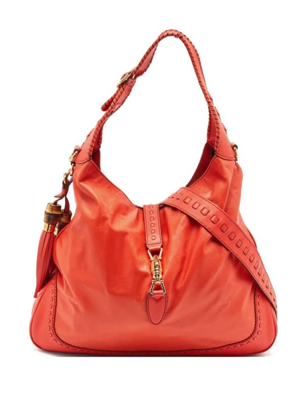 31330440_60934958_1000.jpg Gucci leather tassel bag