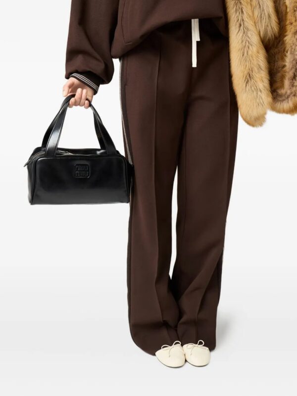 31352231_60682476_1000.jpg Miu Miu leather zipped shoulder bag