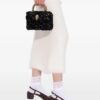 31356628_60992538_1000.jpg Kurt Geiger London mini Kensington sequin-embellished top-handle bag