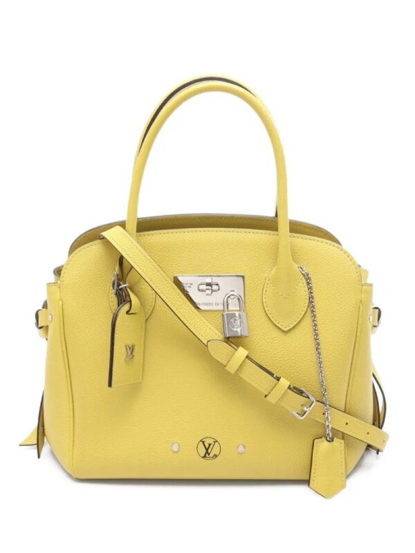 31506236_60936903_1000.jpg Louis Vuitton mirror PM Veil Acid tote bag