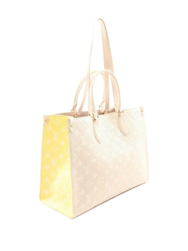 31508069_60922274_1000_c1ff158d-559b-464c-bafc-a267dbf16920.jpg Louis Vuitton On The Go MM monogram empreinte handbag