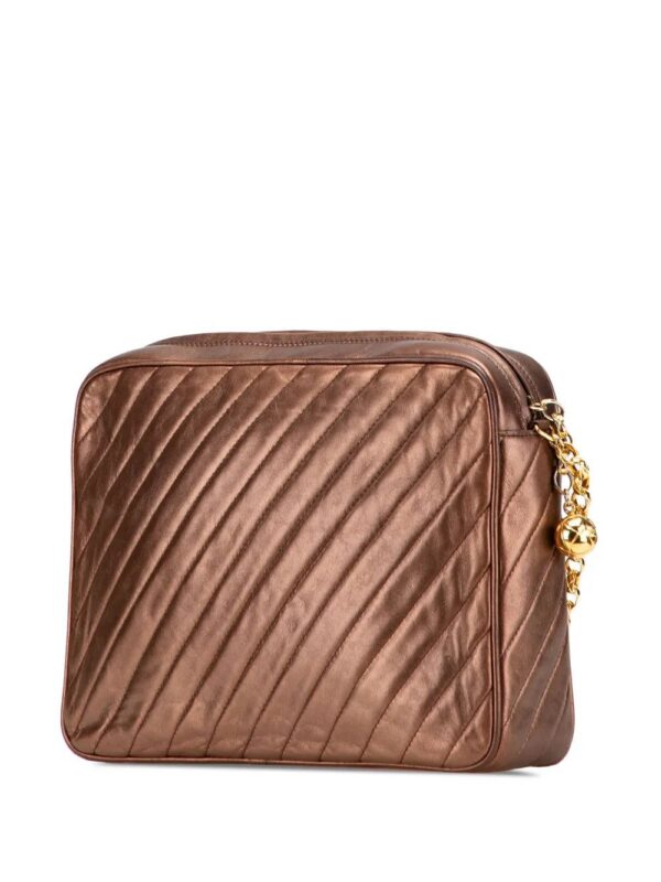 31640291_60934132_1000.jpg CHANEL - CC Diagonal Quilted Metallic Lambskin Camera Bag crossbody bag