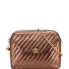 31640291_60934171_1000.jpg CHANEL - CC Diagonal Quilted Metallic Lambskin Camera Bag crossbody bag