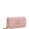 22052987_52043932_1000.jpg Dolce & Gabbana 3.5 logo-plaque clutch bag