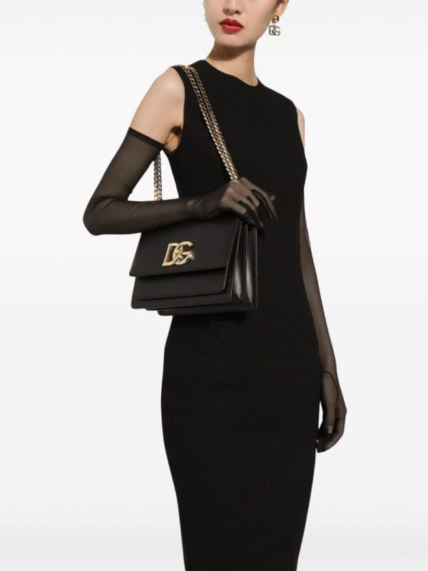 22052992_52050798_1000.jpg Dolce & Gabbana logo-plaque leather crossbody bag