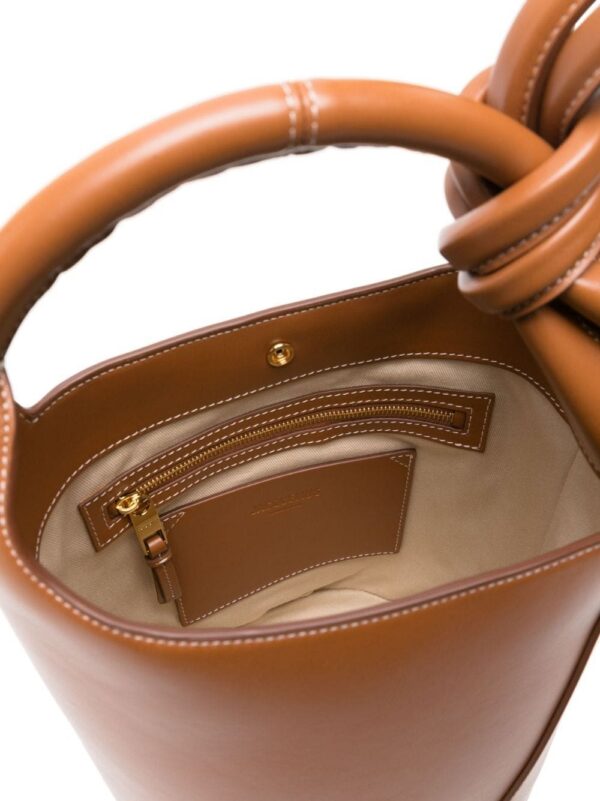 22240970_52513279_1000.jpg Jacquemus Le Petit Tourni leather bucket bag