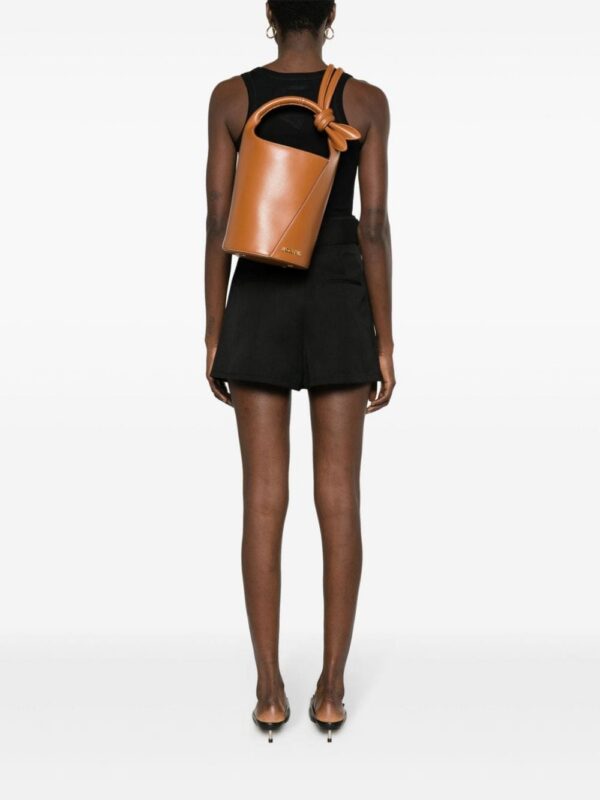 22240970_52513283_1000.jpg Jacquemus Le Petit Tourni leather bucket bag