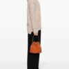 22261820_52123116_1000.jpg Tory Burch Double T embossed-monogram bucket bag