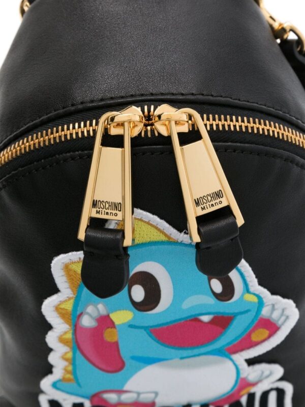 22279061_52137337_1000.jpg Moschino logo-appliqué mini backpack