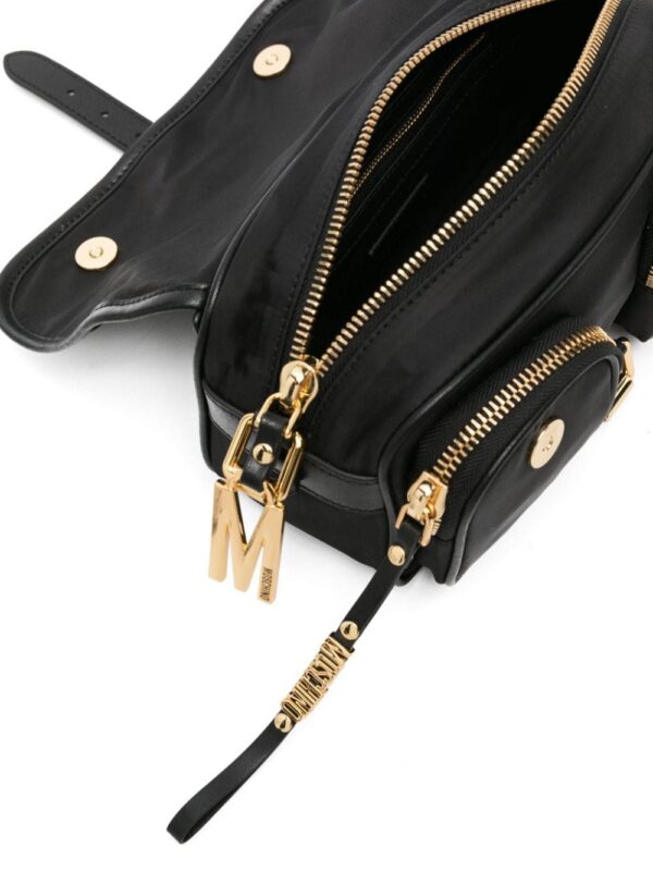 22301428_52557829_1000.jpg Moschino buckled logo-lettering crossbody bag