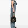 22301430_52800847_1000.jpg Moschino zip-trim leather bucket bag