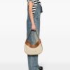 22301448_52801358_1000.jpg Moschino exposed-zip canvas shoulder bag