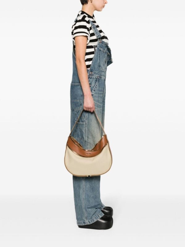22301448_52801358_1000.jpg Moschino exposed-zip canvas shoulder bag