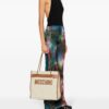 22303327_52177134_1000.jpg Moschino logo-patch canvas shoulder bag