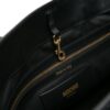 22303328_52173743_1000.jpg Moschino logo-print interwoven leather tote bag