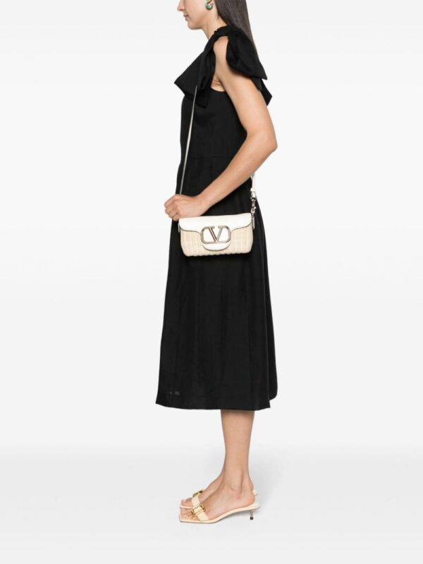 22346758_53712384_1000.jpg Valentino Garavani Locò raffia crossbody bag