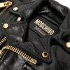 22348140_52277447_1000.jpg Moschino Biker high-shine leather bag