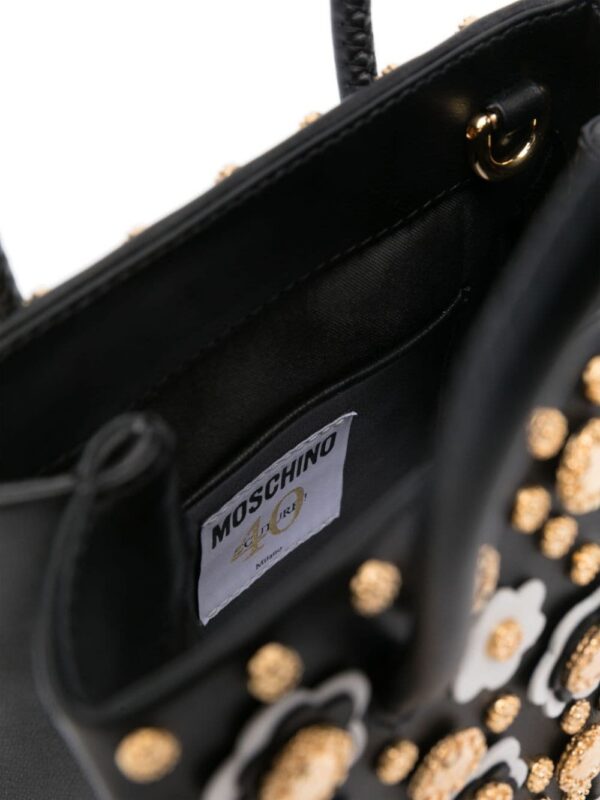 22499555_52464970_1000.jpg Moschino floral stud-detailing tote bag