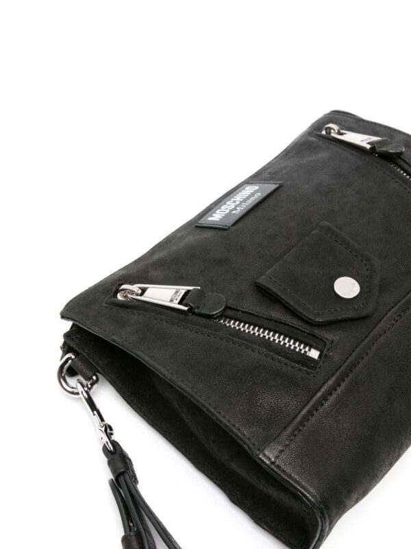 22538711_52526480_1000.jpg Moschino logo-patch nubuck clutch bag