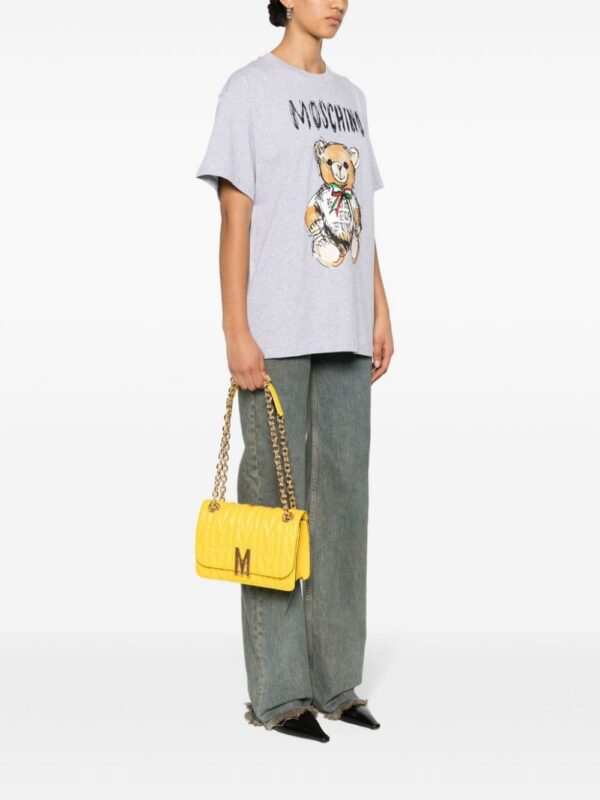 22717520_52935580_1000.jpg Moschino logo-quilted crossbody bag