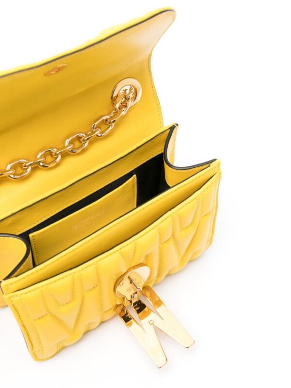 22718063_52935062_1000.jpg Moschino small logo-quilted crossbody bag