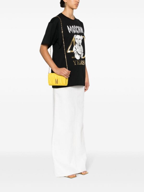 22718249_52935756_1000.jpg Moschino logo-quilted crossbody bag